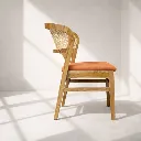 MAYA TEAK RATTAN CHAIR Side Angle.webp