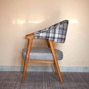 Tarang Teak Wood Armchair Side Angle .webp
