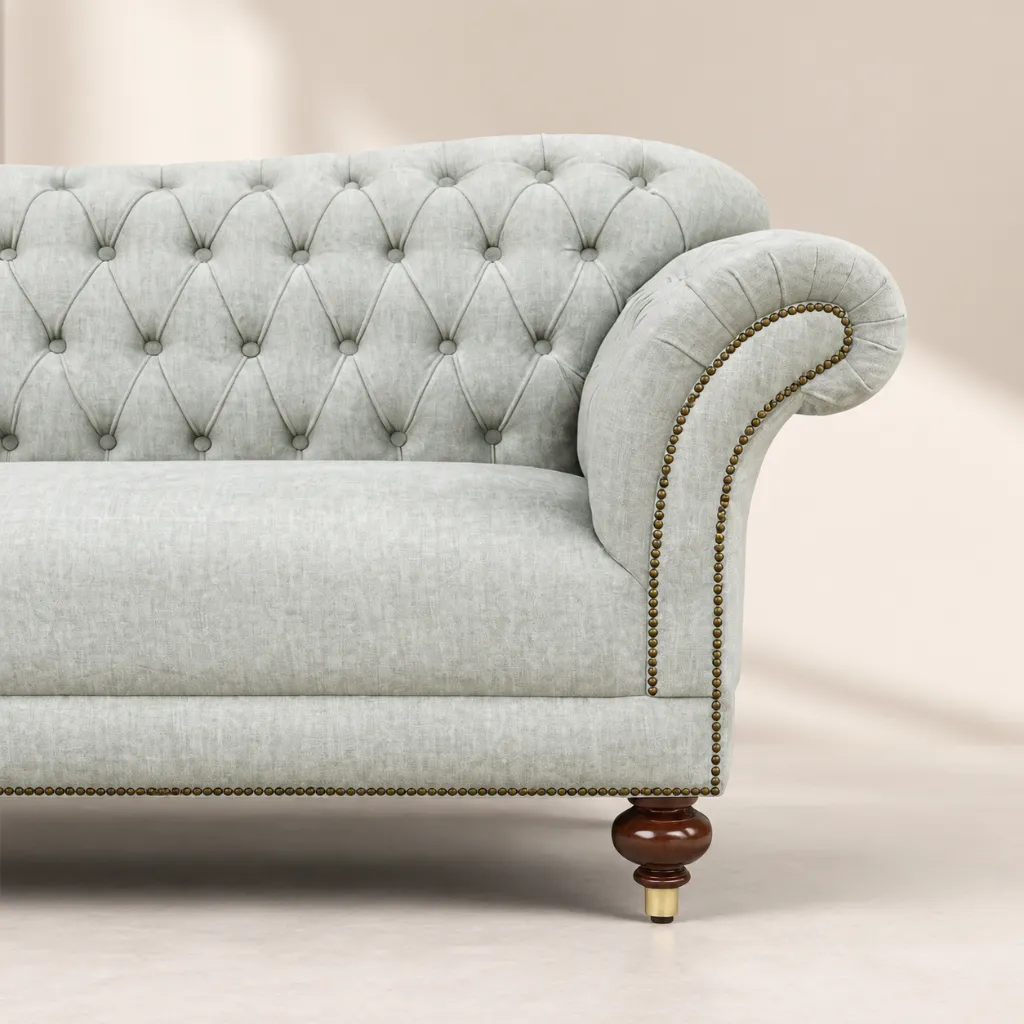 Tufted Sofa with Brass Nailhead Details.webp