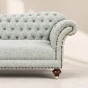 Tufted Sofa with Brass Nailhead Details.webp